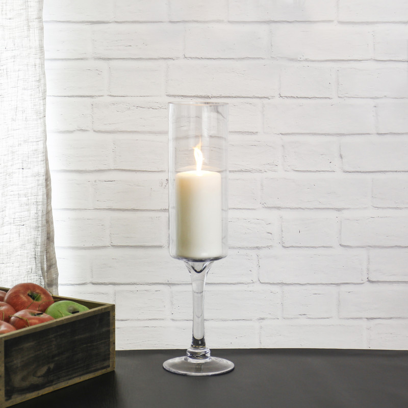A single pillar candle can turn this modern glass into a classic, almost medieval, vintage candle holder
